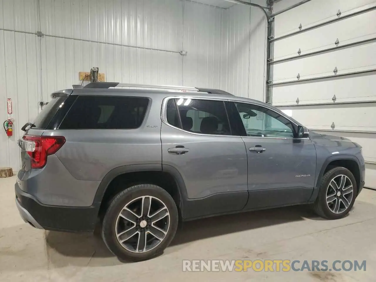 3 Photograph of a damaged car 1GKKNULSXMZ174159 GMC ACADIA 2021