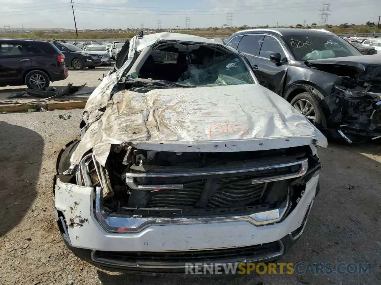 5 Photograph of a damaged car 1GKKNML49NZ162300 GMC ACADIA 2022