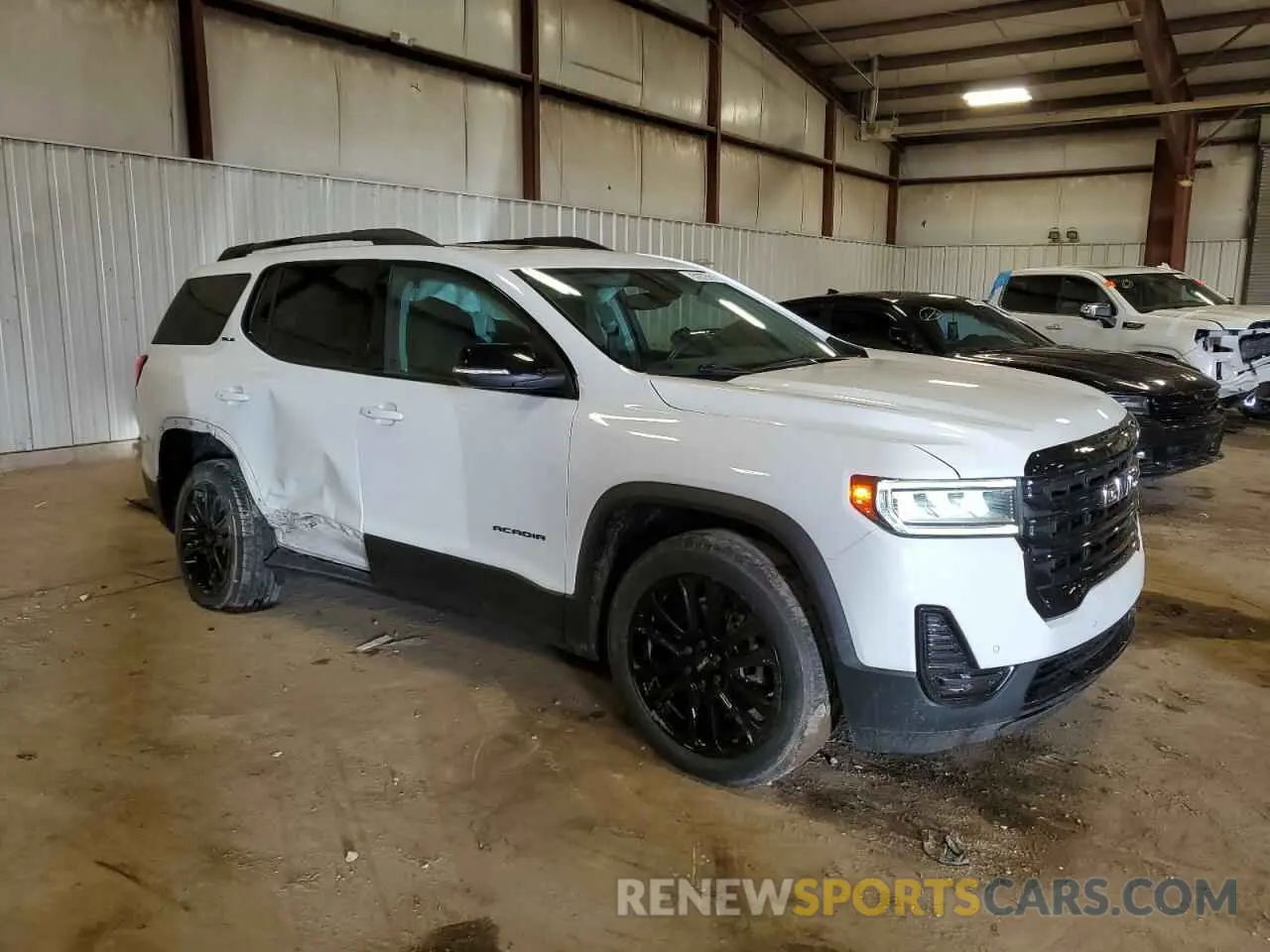 4 Photograph of a damaged car 1GKKNRL44NZ106908 GMC ACADIA 2022