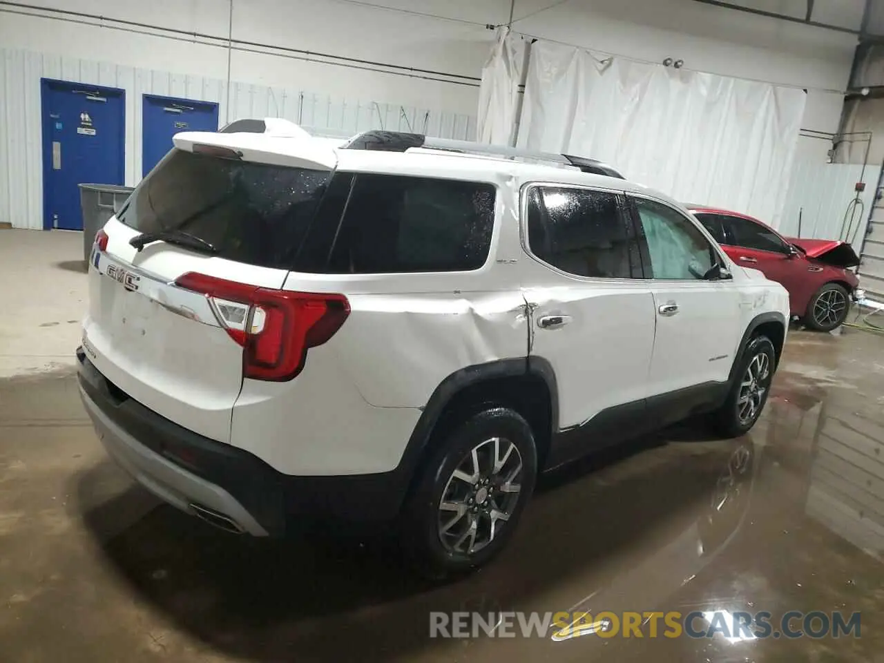 3 Photograph of a damaged car 1GKKNKL40PZ180661 GMC ACADIA 2023