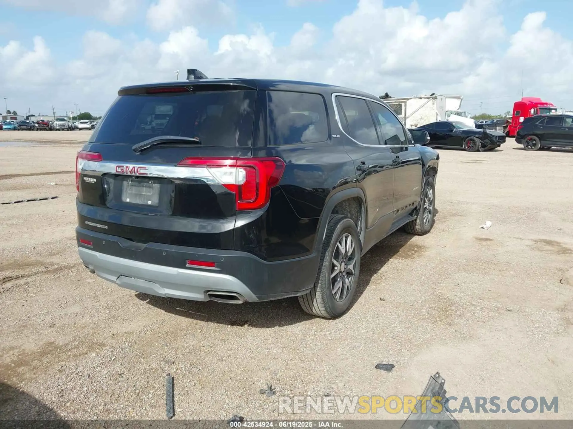 4 Photograph of a damaged car 1GKKNKL42PZ158953 GMC ACADIA 2023