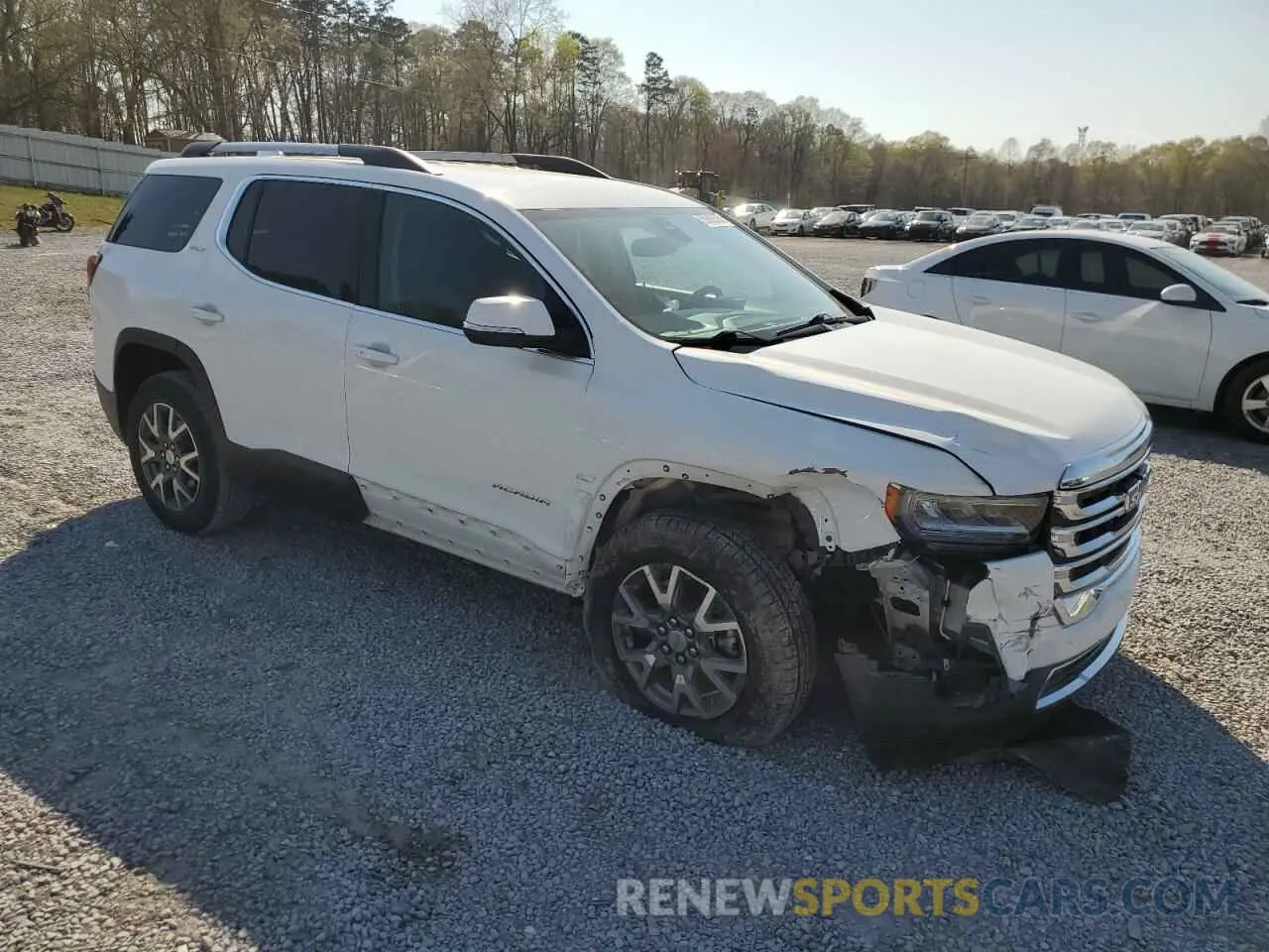 4 Photograph of a damaged car 1GKKNML41PZ238143 GMC ACADIA 2023