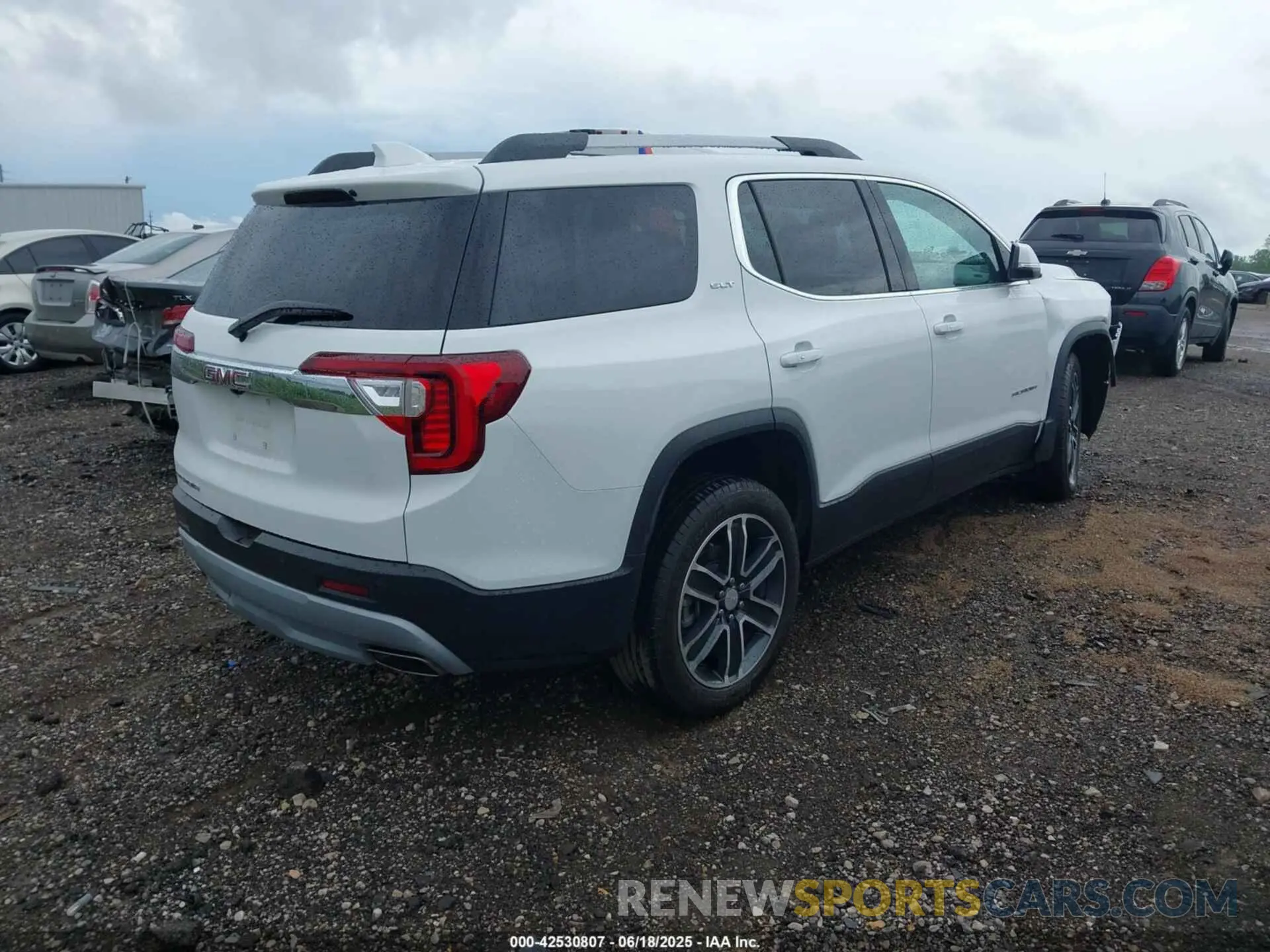 4 Photograph of a damaged car 1GKKNML42PZ138438 GMC ACADIA 2023