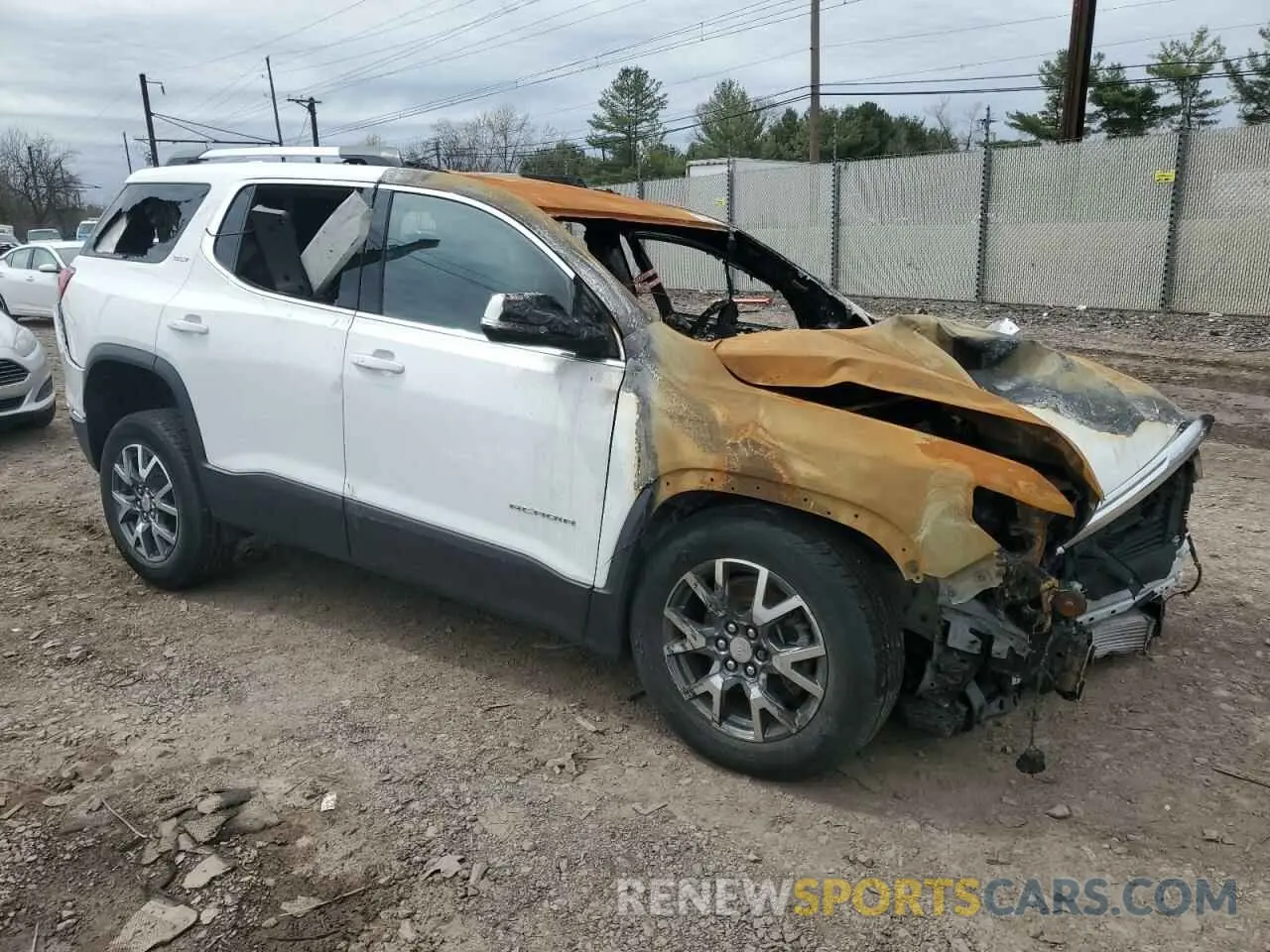 4 Photograph of a damaged car 1GKKNML45PZ233432 GMC ACADIA 2023