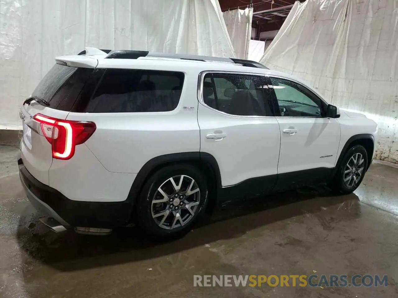 3 Photograph of a damaged car 1GKKNML46PZ254788 GMC ACADIA 2023