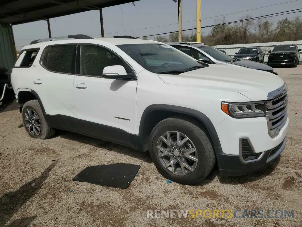 4 Photograph of a damaged car 1GKKNML47PZ238017 GMC ACADIA 2023