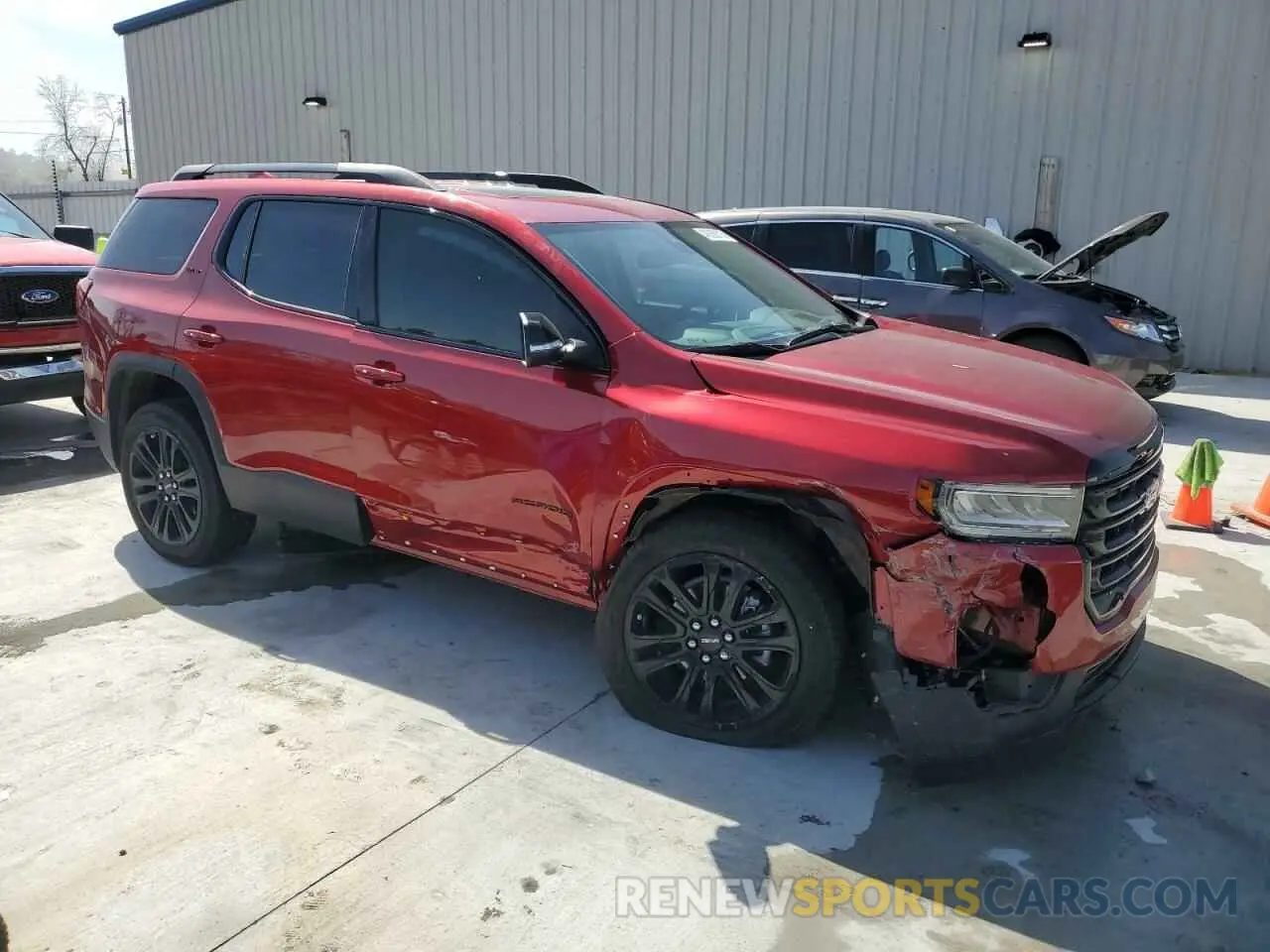 4 Photograph of a damaged car 1GKKNMLS1PZ261100 GMC ACADIA 2023