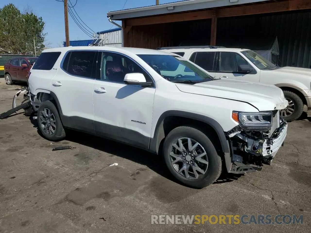 4 Photograph of a damaged car 1GKKNRL48PZ217772 GMC ACADIA 2023