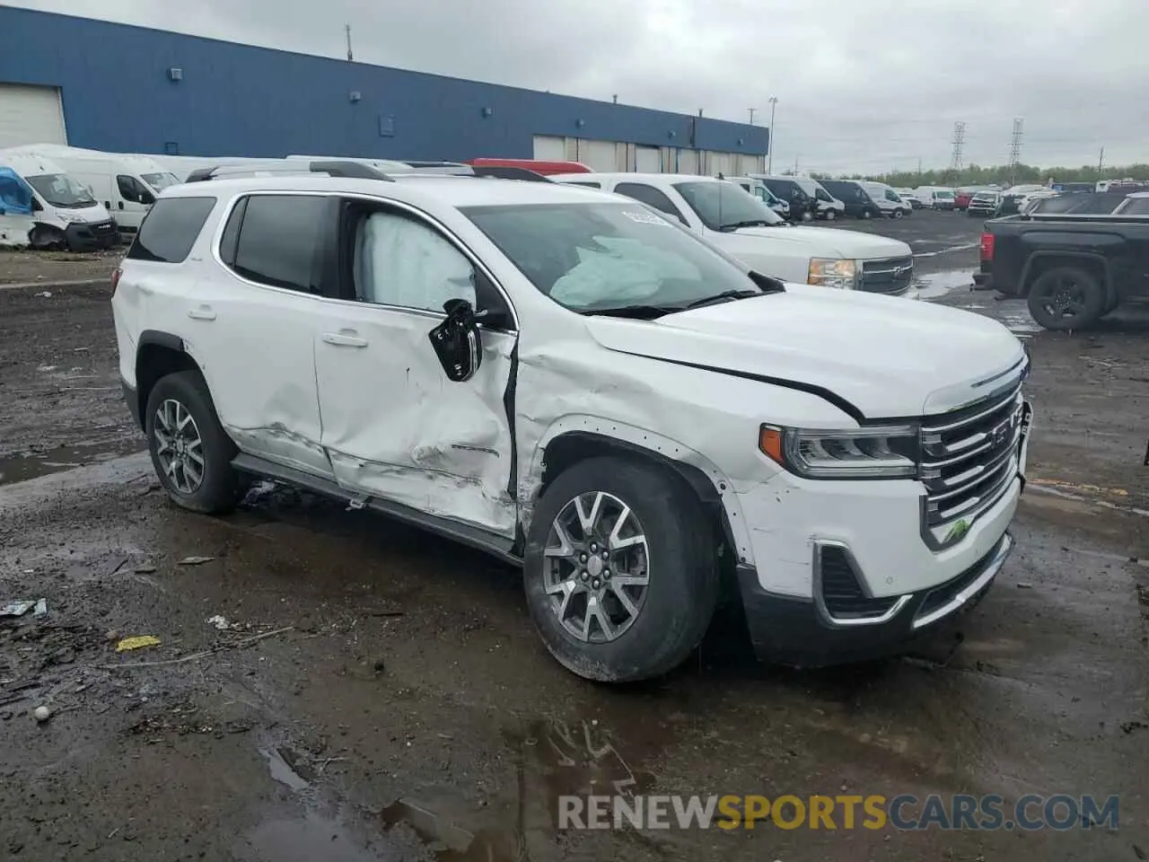 4 Photograph of a damaged car 1GKKNRL49PZ217814 GMC ACADIA 2023