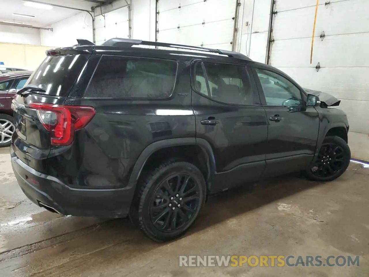 3 Photograph of a damaged car 1GKKNUL44PZ236757 GMC ACADIA 2023