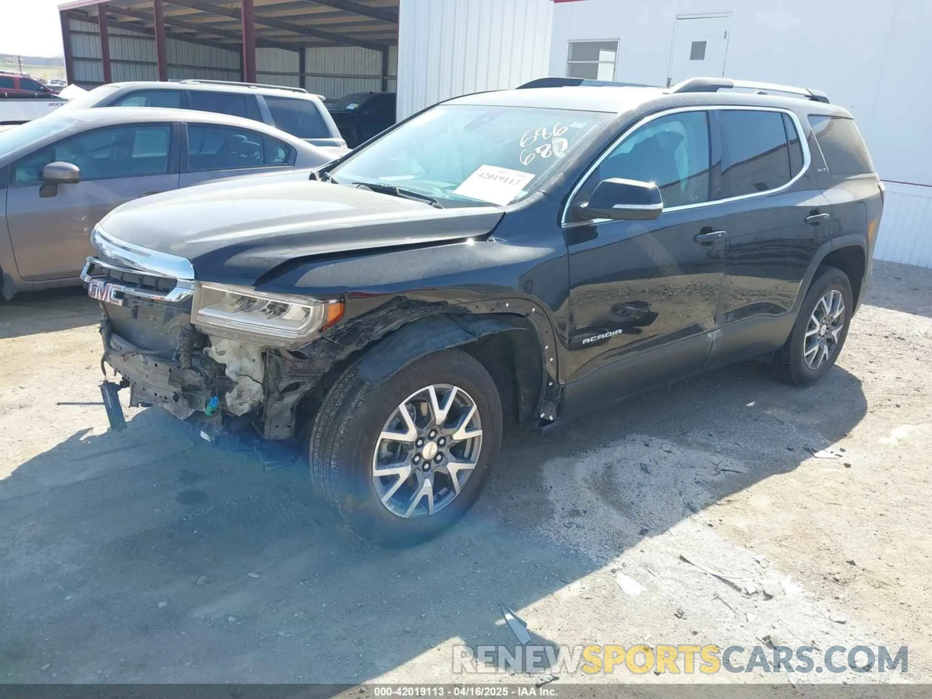 2 Photograph of a damaged car 1GKKNUL45PZ233933 GMC ACADIA 2023