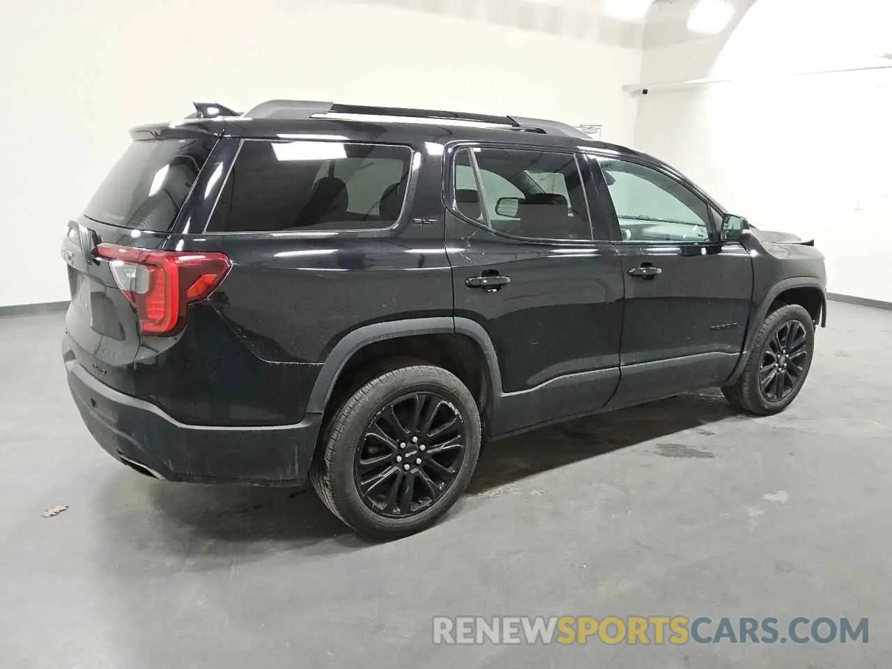 3 Photograph of a damaged car 1GKKNUL48PZ111180 GMC ACADIA 2023