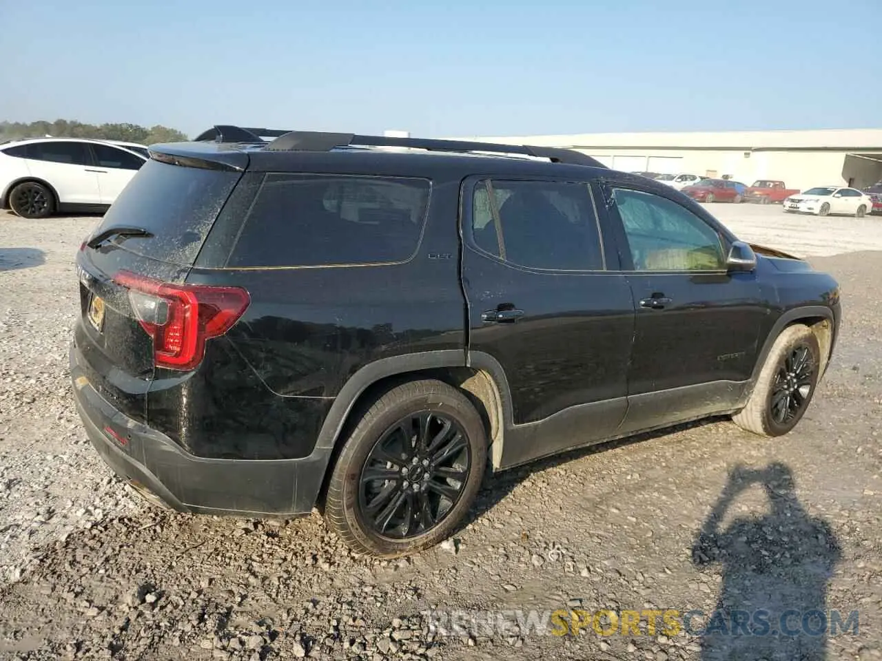 3 Photograph of a damaged car 1GKKNUL48PZ173744 GMC ACADIA 2023