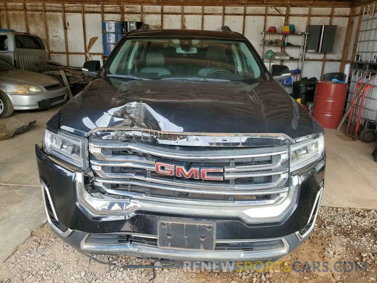 5 Photograph of a damaged car 1GKKNUL48PZ250693 GMC ACADIA 2023