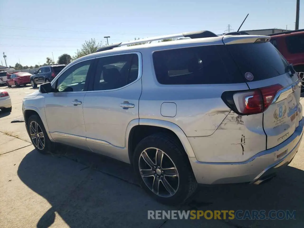 2 Photograph of a damaged car 1GKKNPLS2KZ106047 GMC ACADIA DEN 2019