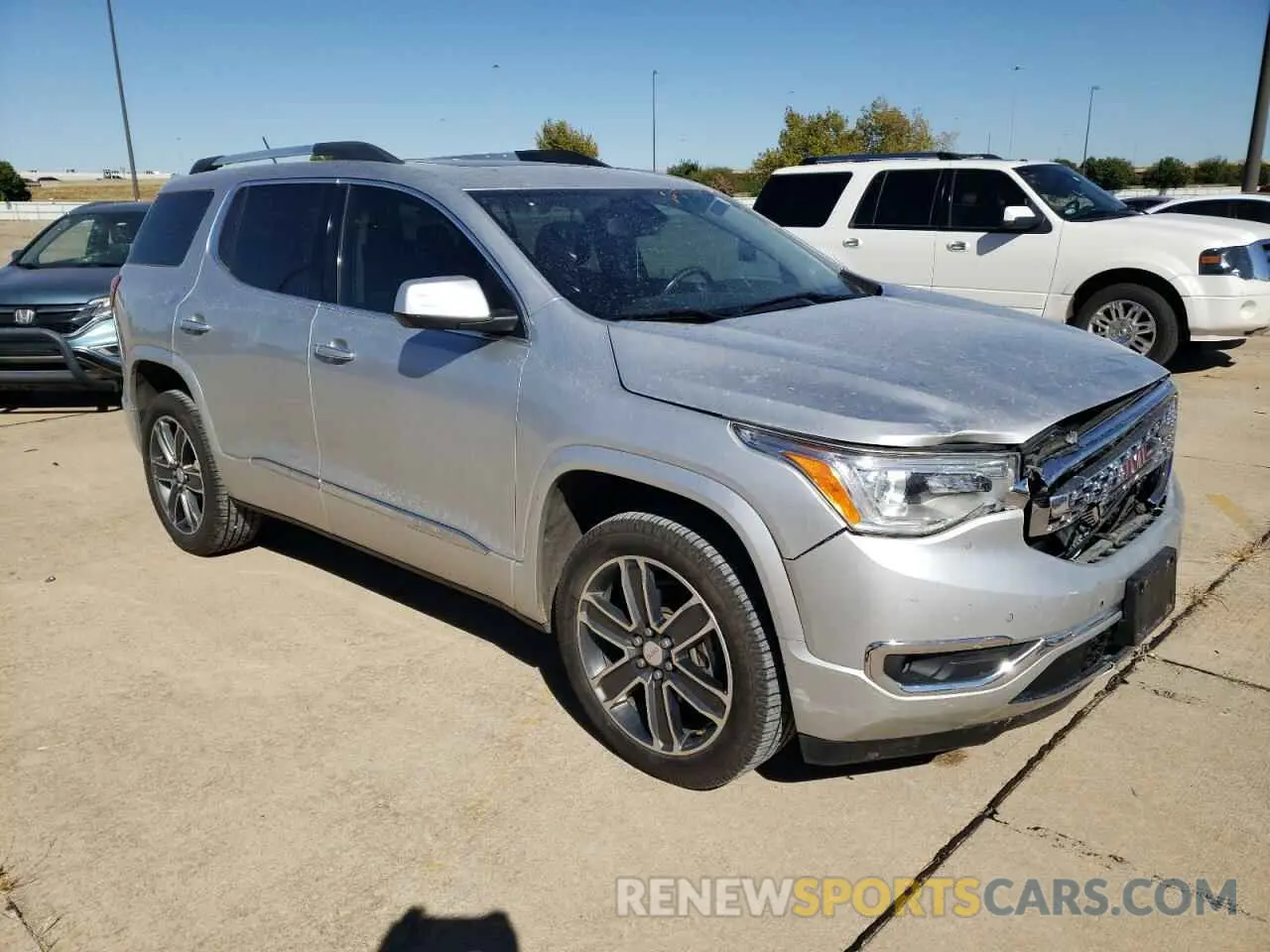 4 Photograph of a damaged car 1GKKNPLS2KZ106047 GMC ACADIA DEN 2019