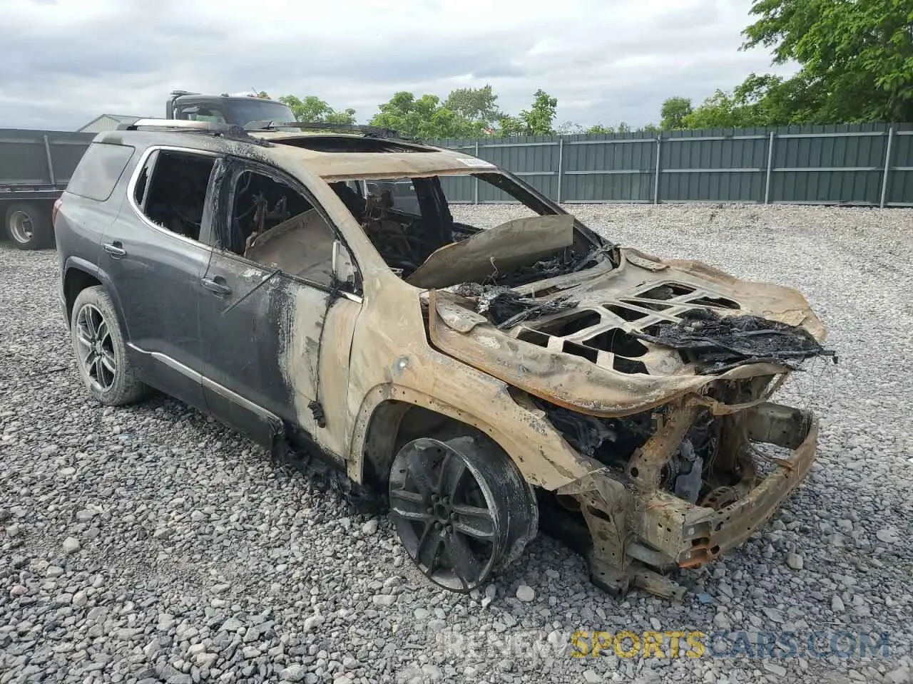 4 Photograph of a damaged car 1GKKNPLS6KZ113275 GMC ACADIA DEN 2019