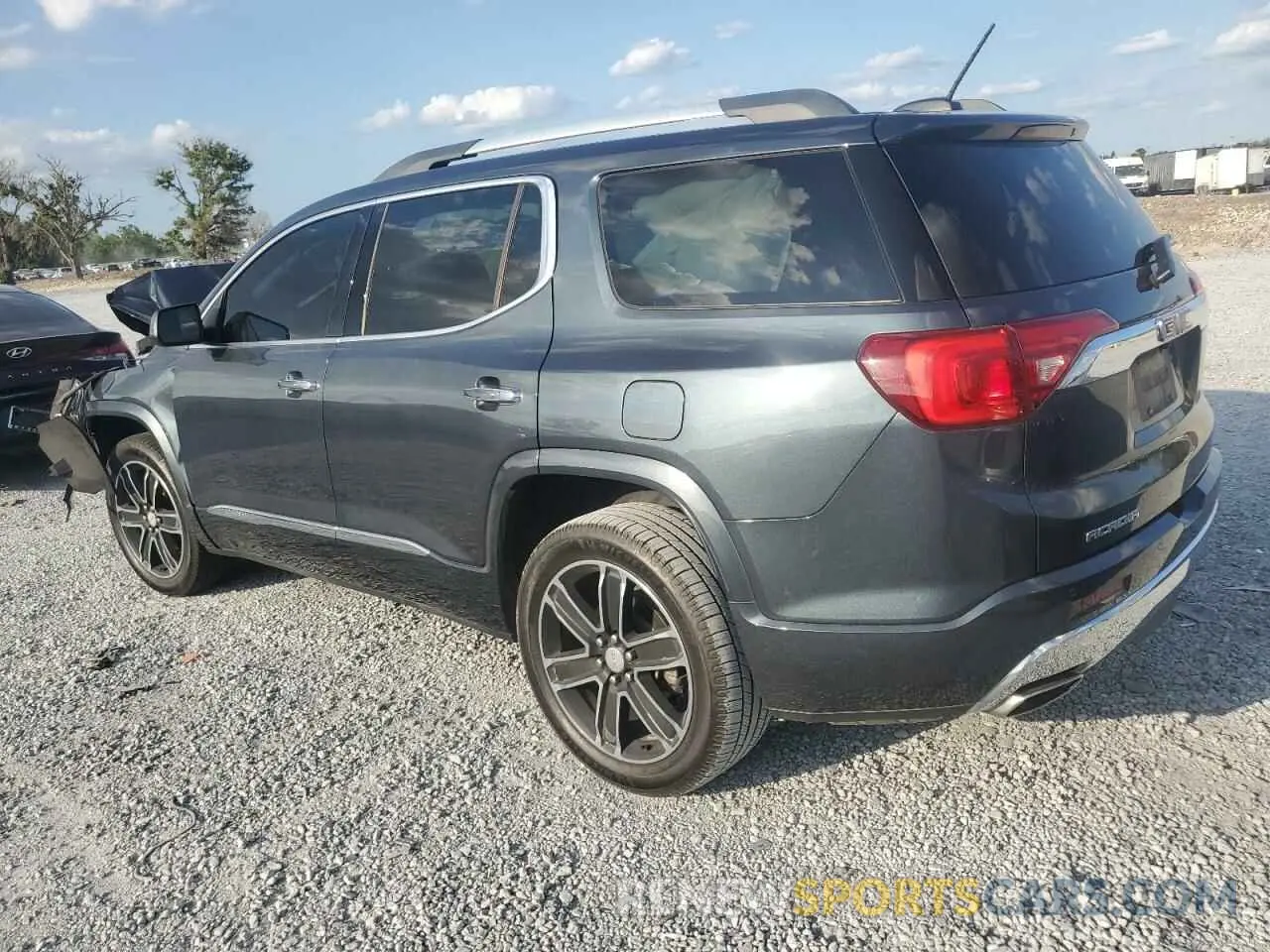 2 Photograph of a damaged car 1GKKNPLS7KZ137018 GMC ACADIA DEN 2019