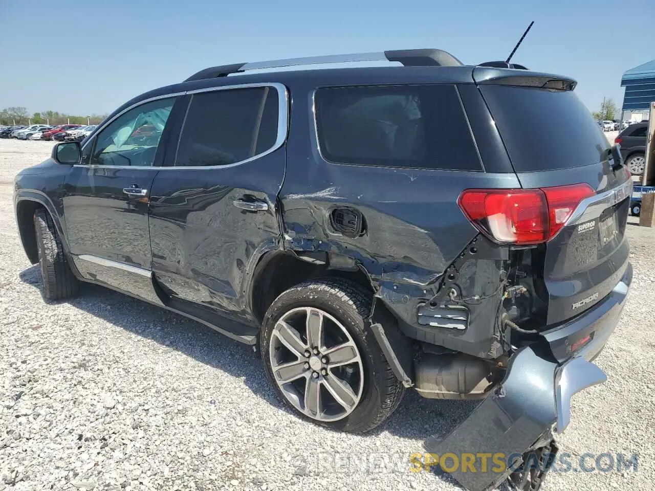 2 Photograph of a damaged car 1GKKNXLS1KZ242671 GMC ACADIA DEN 2019