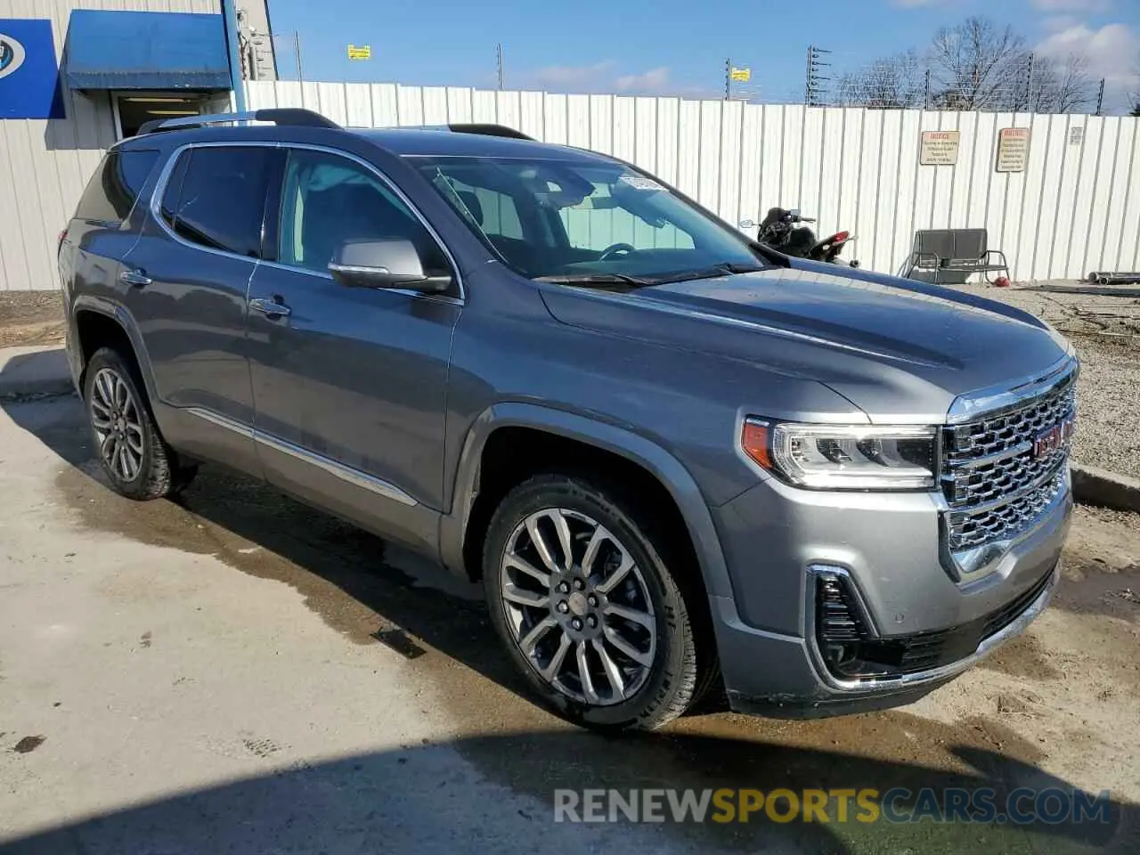 4 Photograph of a damaged car 1GKKNPLS1MZ136031 GMC ACADIA DEN 2021