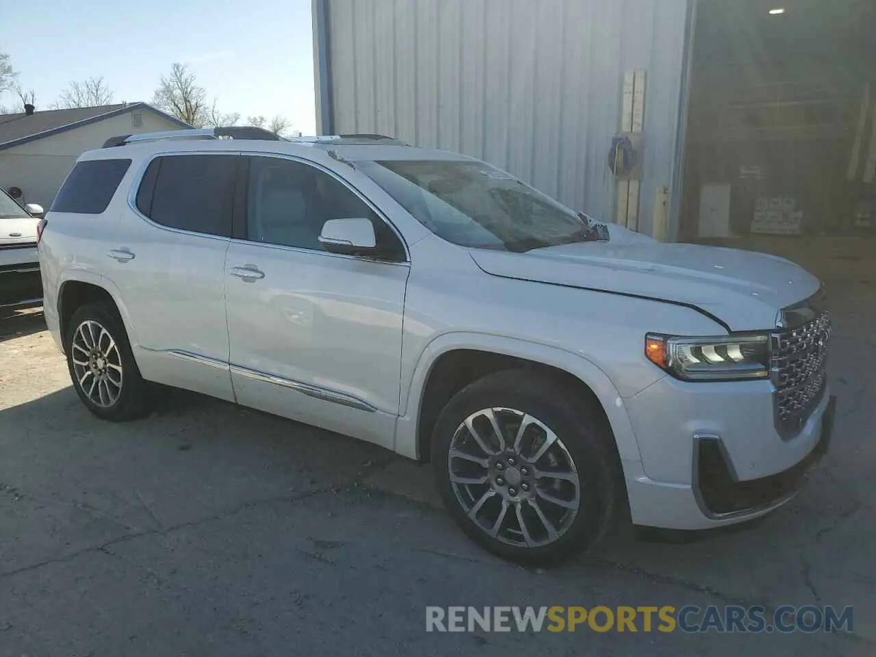 4 Photograph of a damaged car 1GKKNPLS8MZ123860 GMC ACADIA DEN 2021