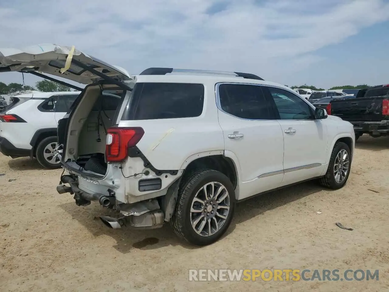 3 Photograph of a damaged car 1GKKNPLS2NZ165586 GMC ACADIA DEN 2022