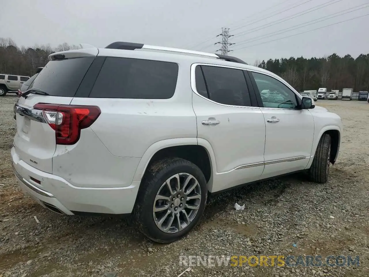 3 Photograph of a damaged car 1GKKNXLS8PZ233022 GMC ACADIA DEN 2023