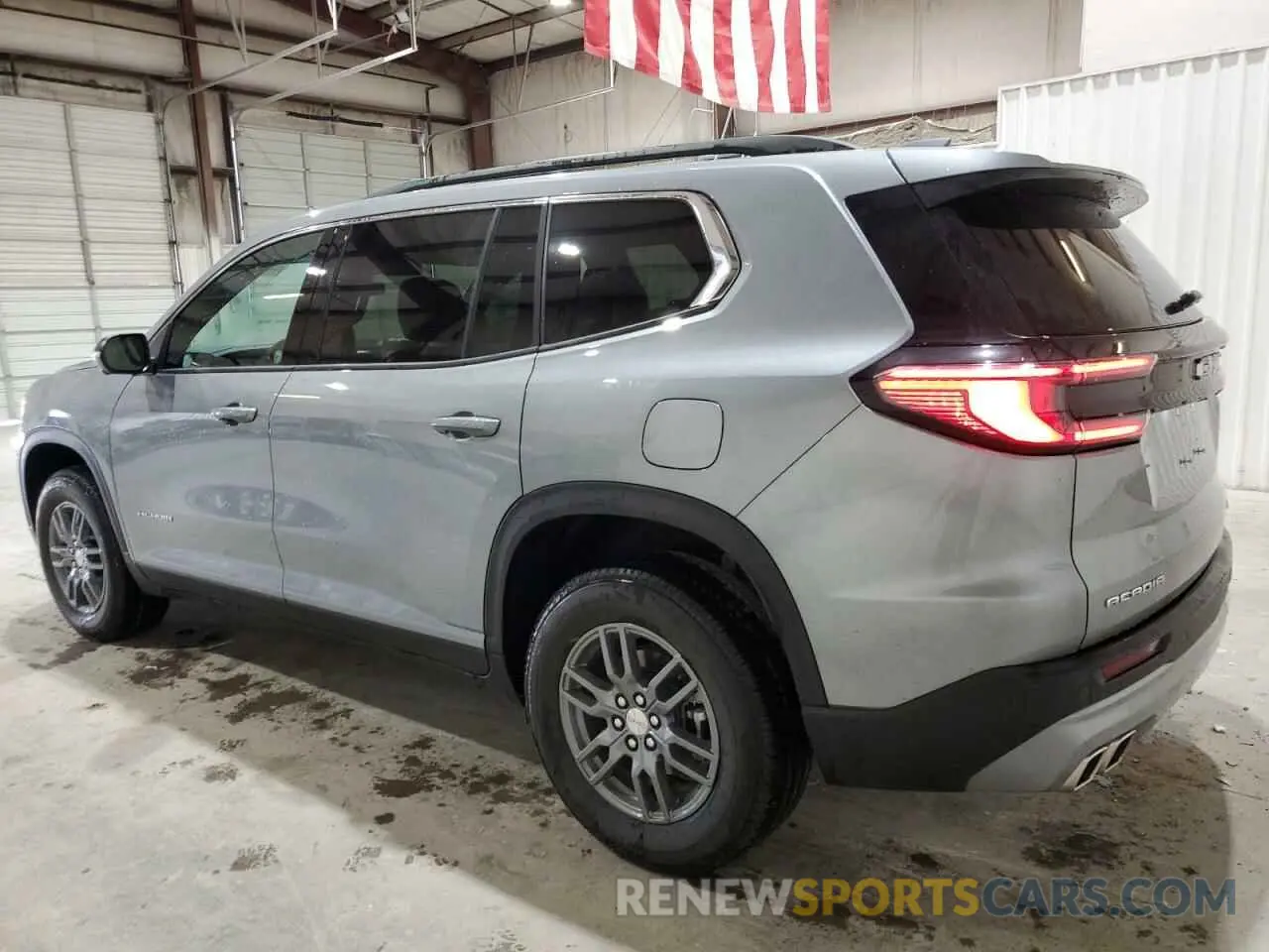 2 Photograph of a damaged car 1GKENKRS3SJ156249 GMC ACADIA ELE 2025