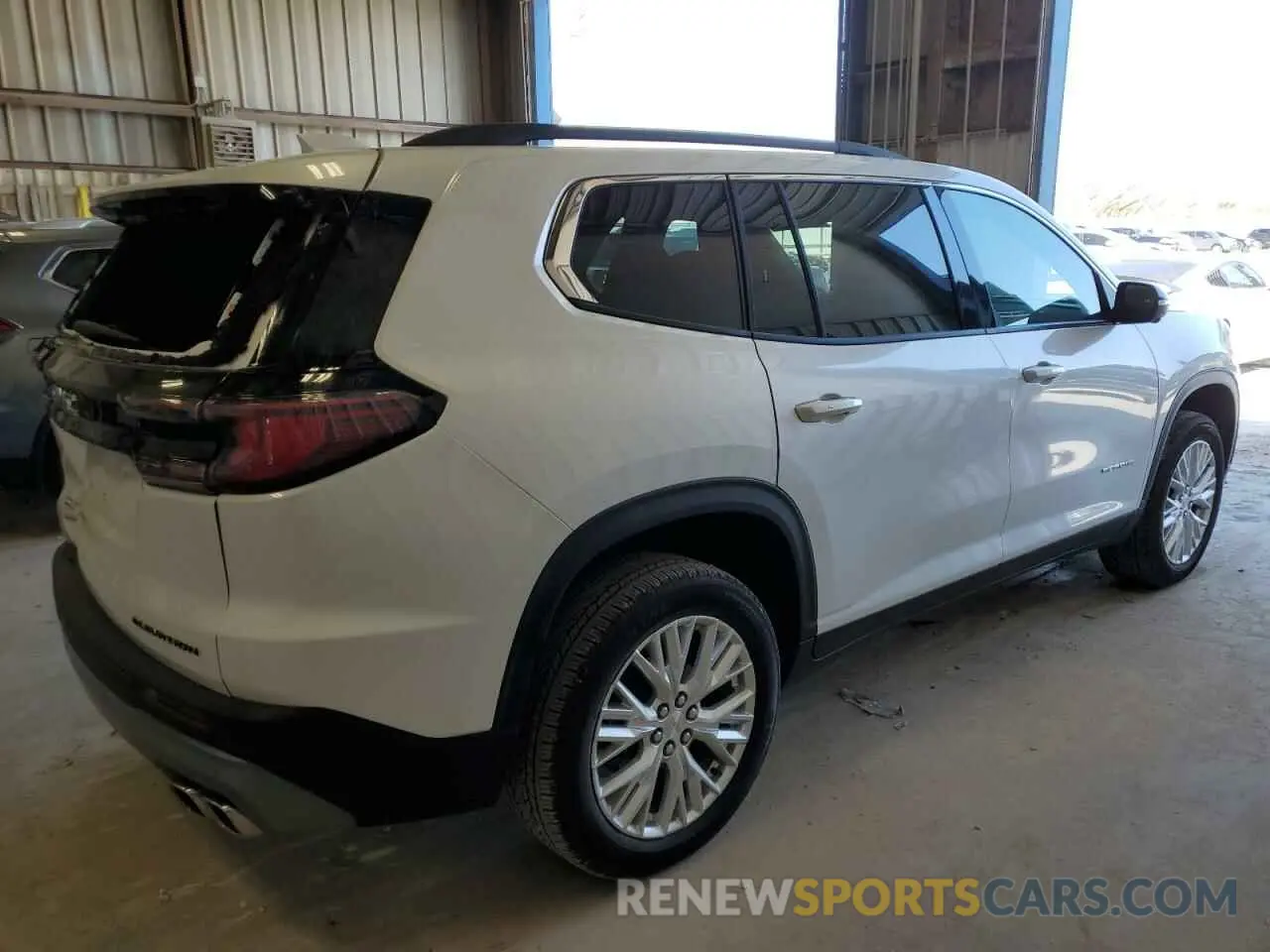 3 Photograph of a damaged car 1GKENKKS1RJ240588 GMC ACADIA UPL 2024