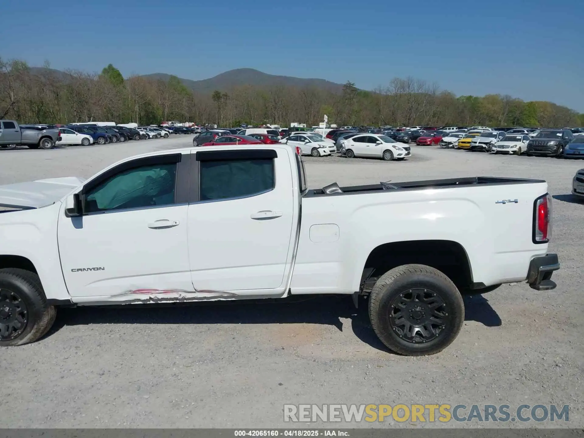 14 Photograph of a damaged car 1GTG6CEN0K1353094 GMC CANYON 2019