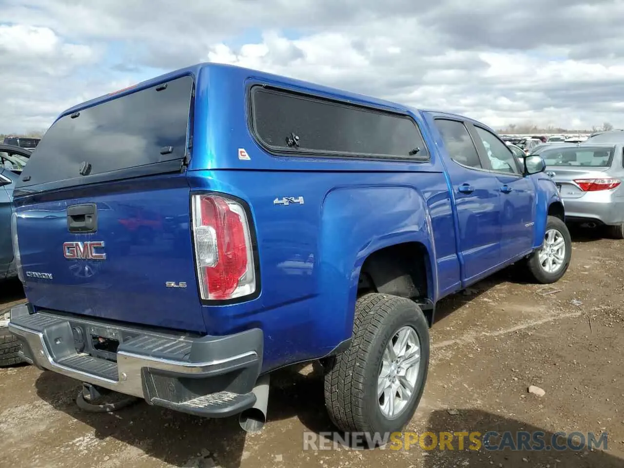3 Photograph of a damaged car 1GTP6CE12K1174133 GMC CANYON 2019