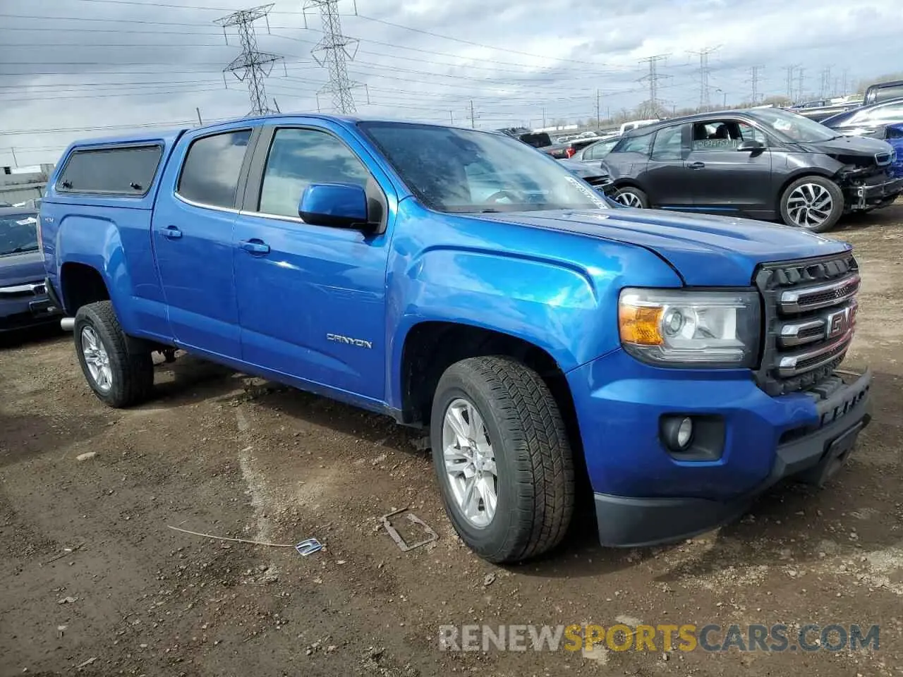 4 Photograph of a damaged car 1GTP6CE12K1174133 GMC CANYON 2019