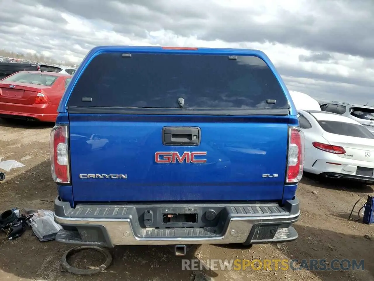 6 Photograph of a damaged car 1GTP6CE12K1174133 GMC CANYON 2019