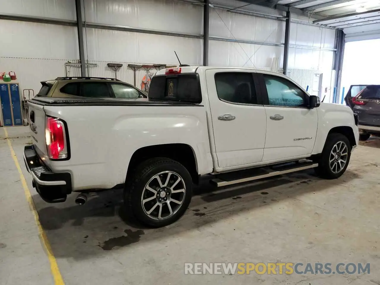 3 Photograph of a damaged car 1GTG6EEN8M1280992 GMC CANYON 2021