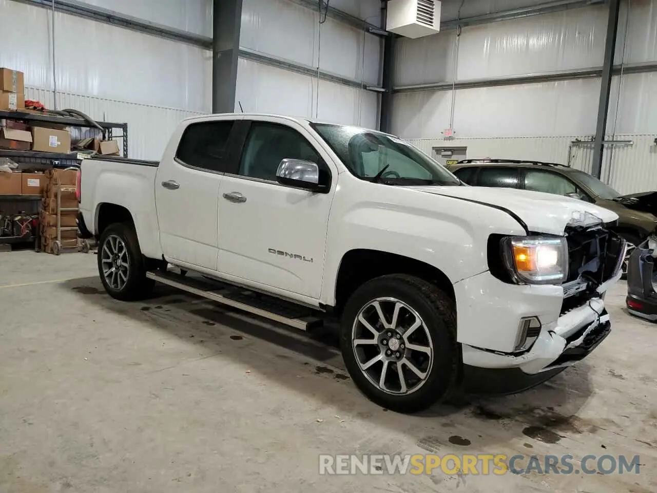 4 Photograph of a damaged car 1GTG6EEN8M1280992 GMC CANYON 2021