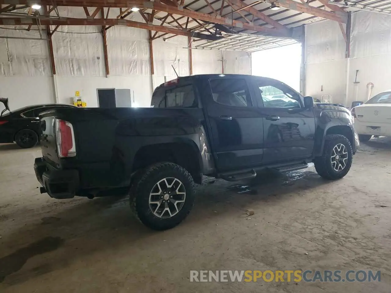 3 Photograph of a damaged car 1GTG6FEN9M1118648 GMC CANYON 2021