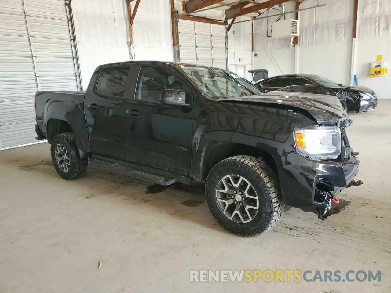 4 Photograph of a damaged car 1GTG6FEN9M1118648 GMC CANYON 2021