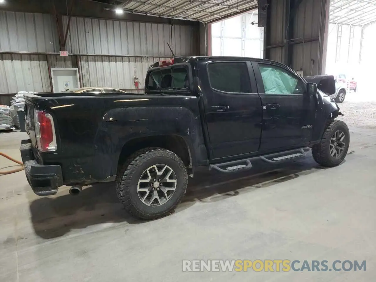 3 Photograph of a damaged car 1GTG6FEN9M1155439 GMC CANYON 2021