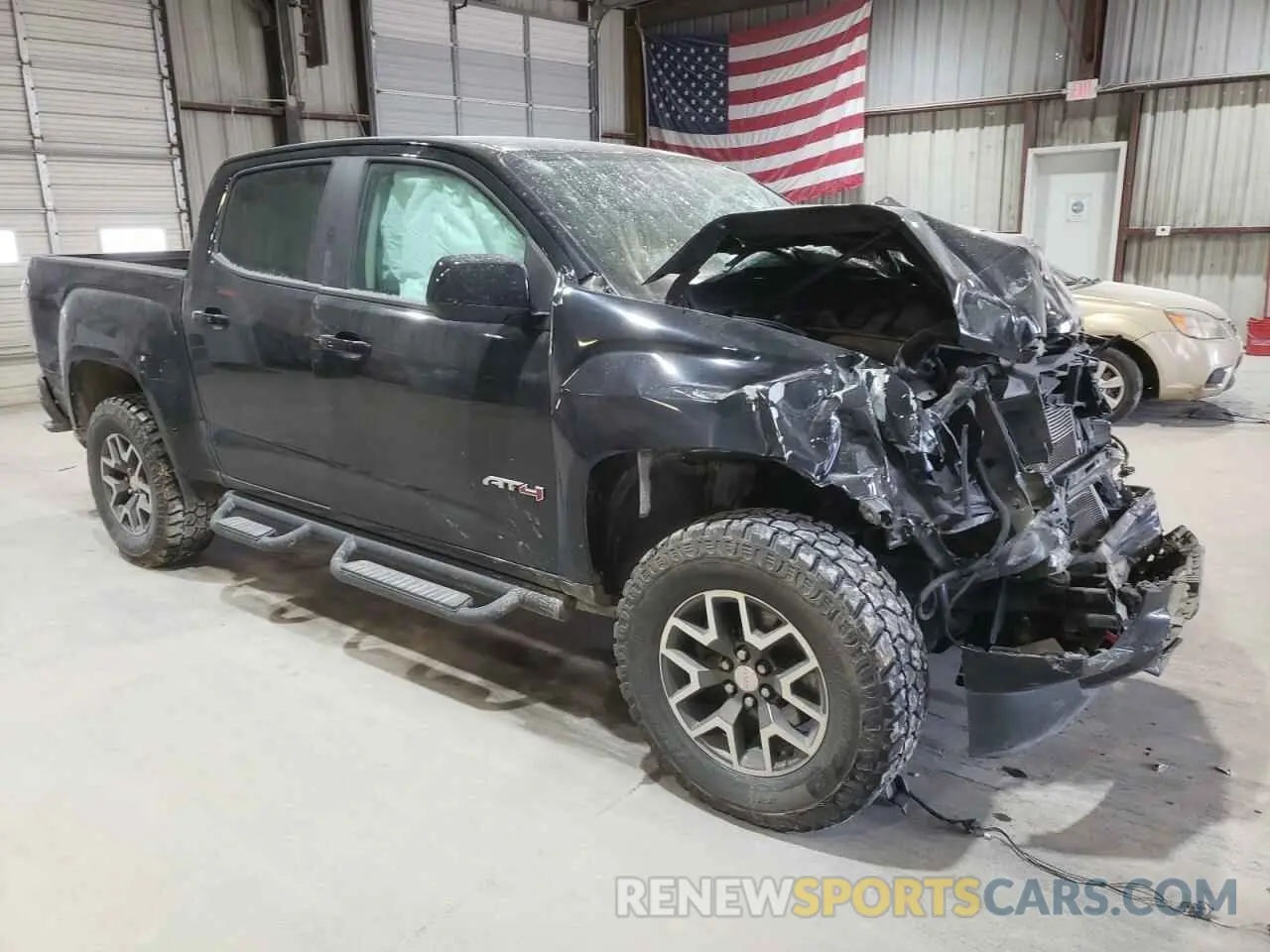 4 Photograph of a damaged car 1GTG6FEN9M1155439 GMC CANYON 2021