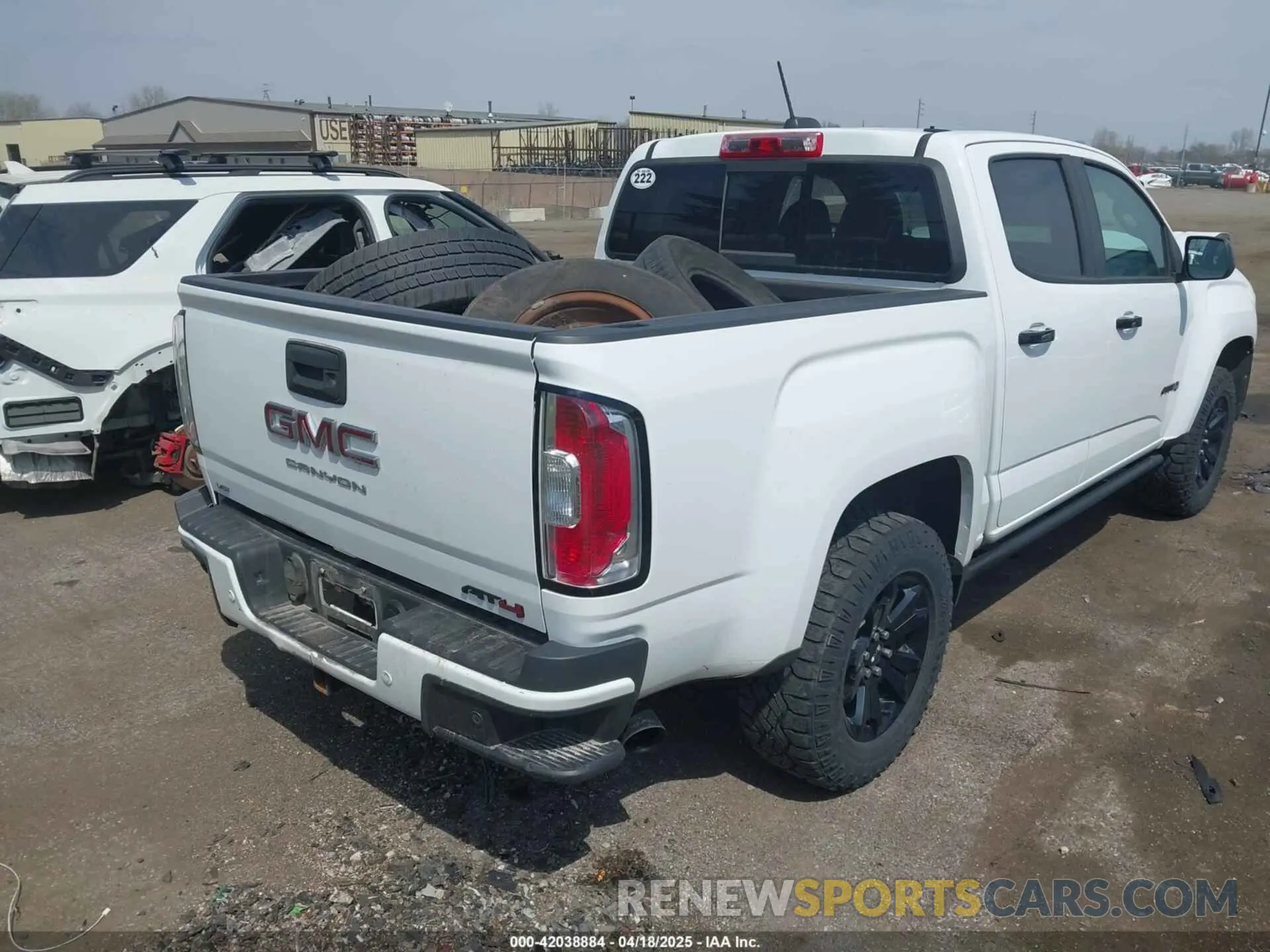 4 Photograph of a damaged car 1GTG6FENXM1291689 GMC CANYON 2021