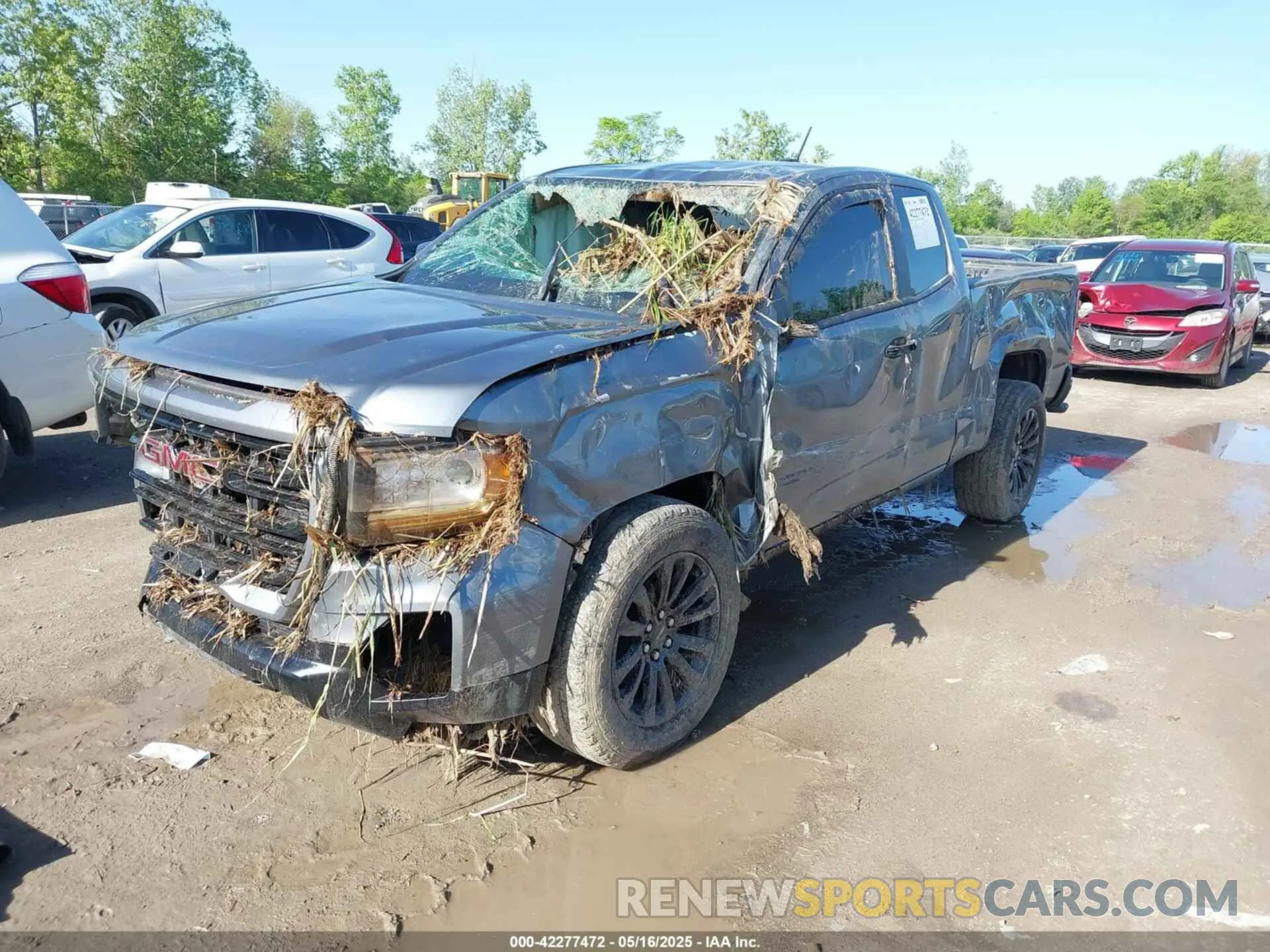 2 Photograph of a damaged car 1GTH6BEN2M1216465 GMC CANYON 2021