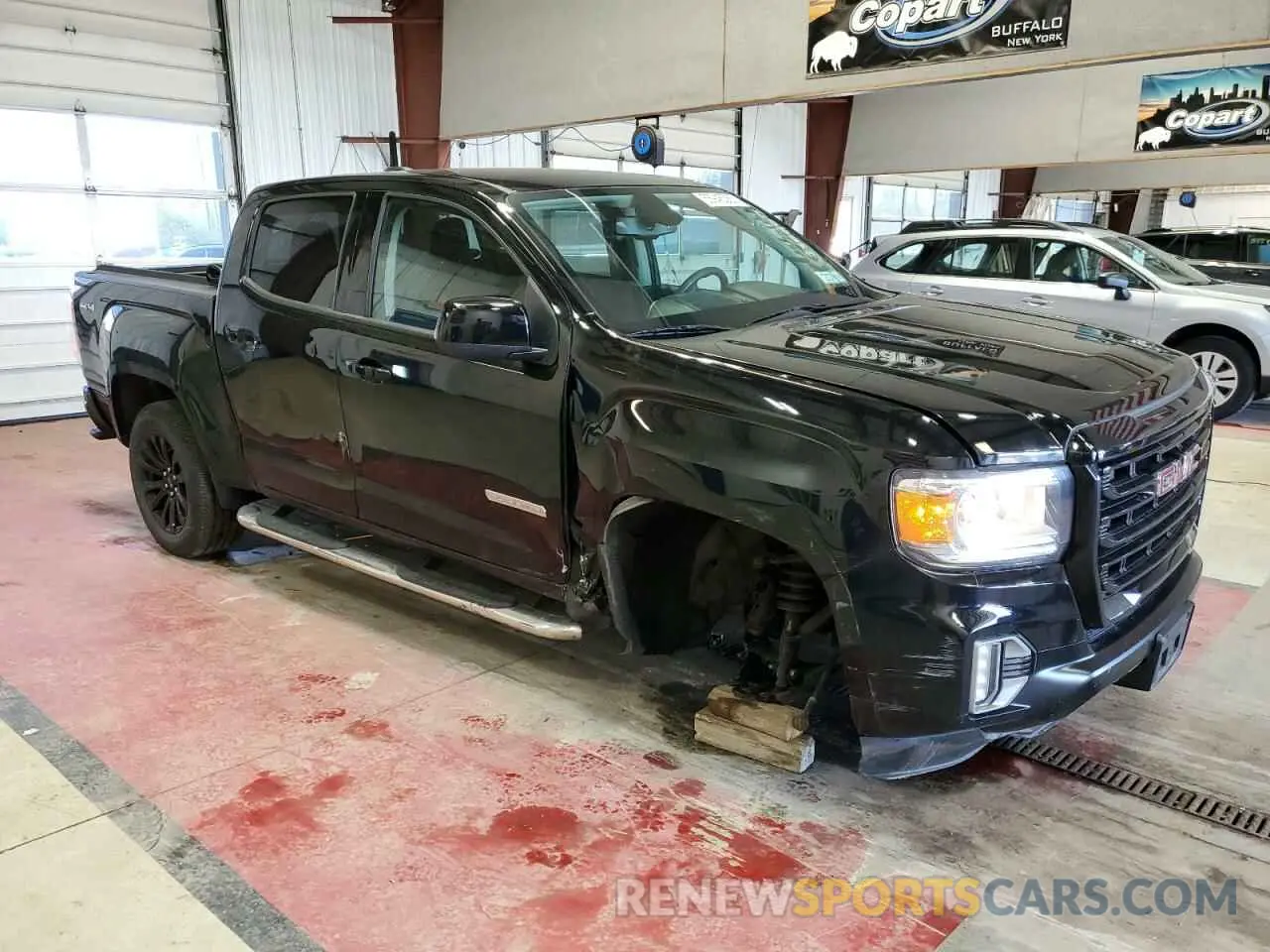 4 Photograph of a damaged car 1GTG6CEN7N1328469 GMC CANYON 2022