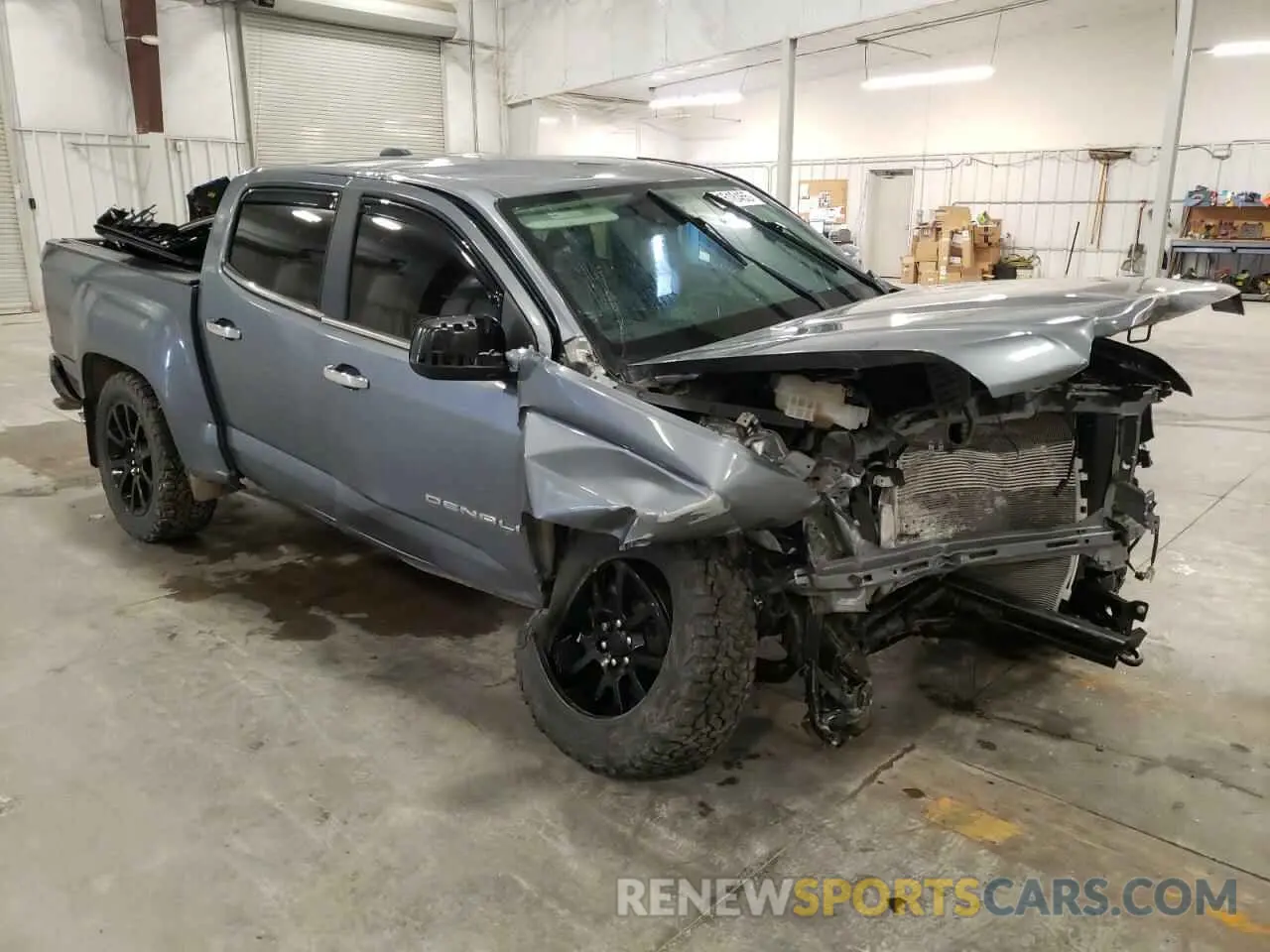 4 Photograph of a damaged car 1GTG6EEN2N1166102 GMC CANYON 2022