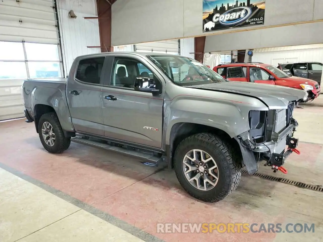 4 Photograph of a damaged car 1GTG6FEN7N1230317 GMC CANYON 2022