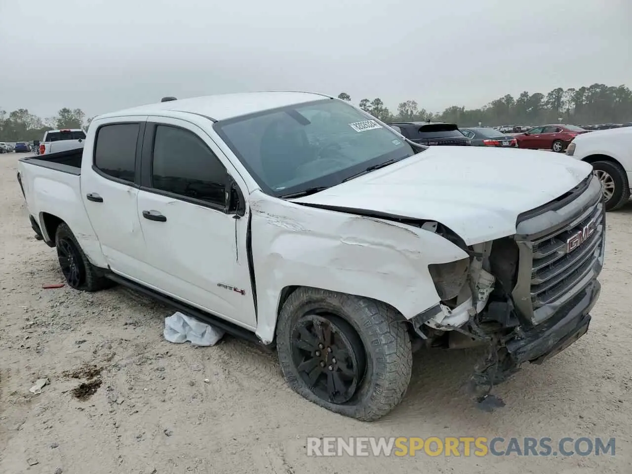 4 Photograph of a damaged car 1GTG6FEN8N1136558 GMC CANYON 2022