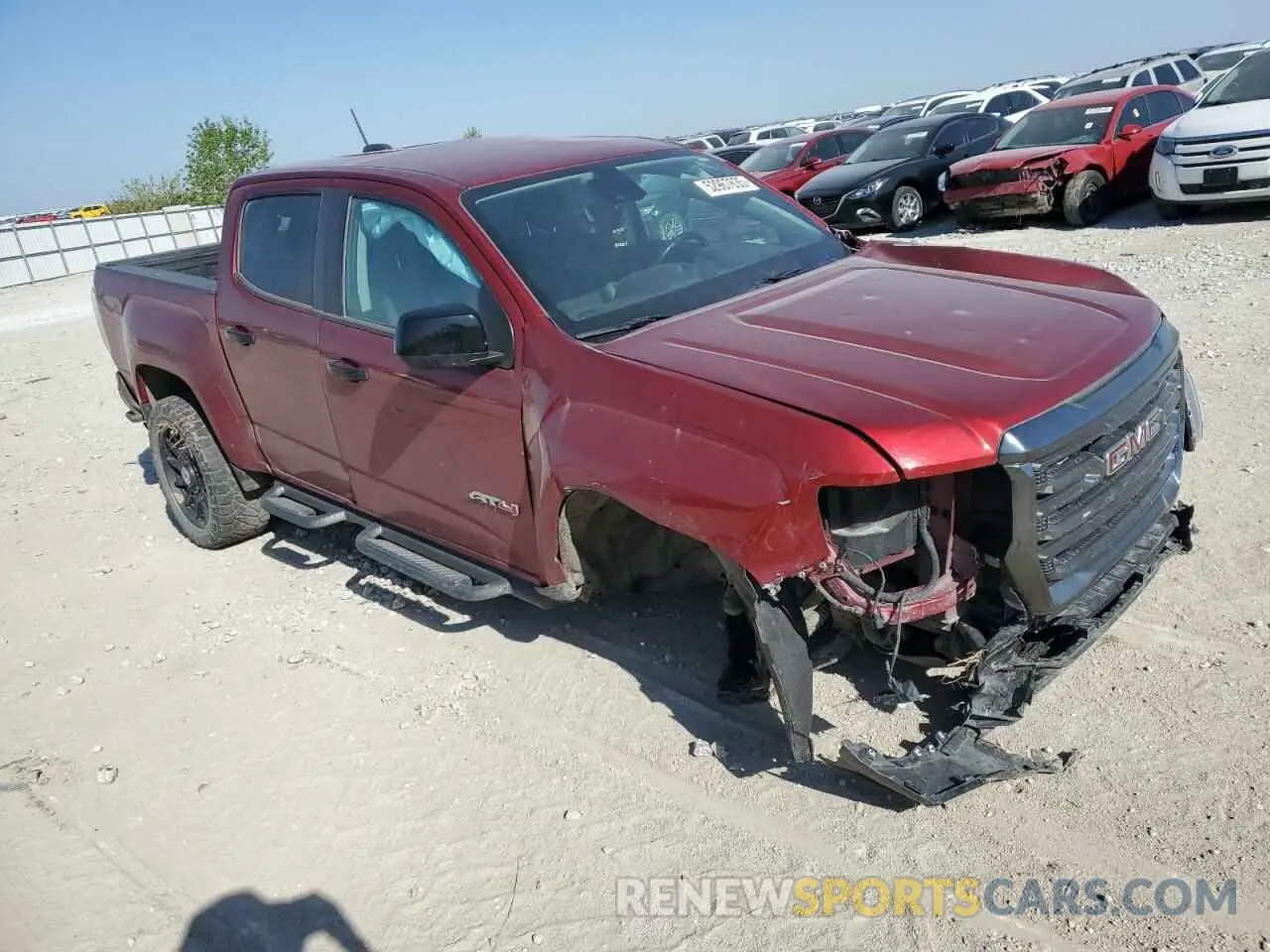 4 Photograph of a damaged car 1GTG6FEN9N1111989 GMC CANYON 2022