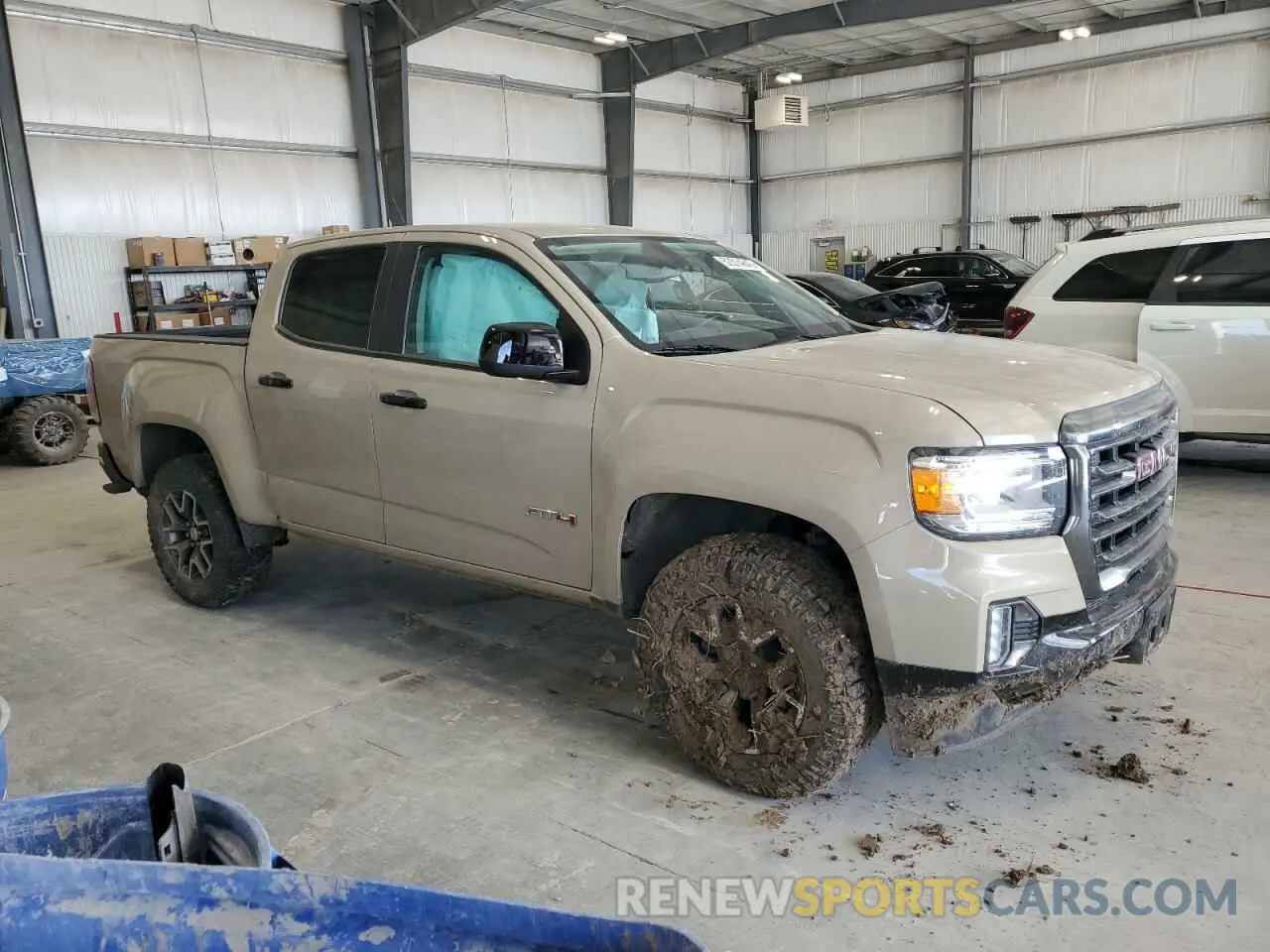 4 Photograph of a damaged car 1GTG6FENXN1283495 GMC CANYON 2022
