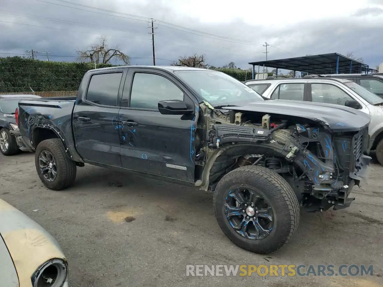 4 Photograph of a damaged car 1GTP5BEK8P1195517 GMC CANYON 2023