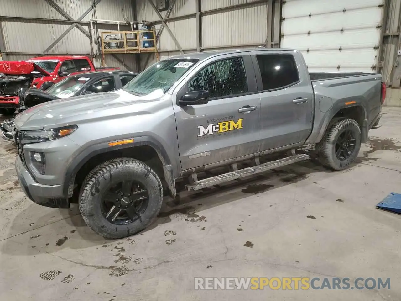 1 Photograph of a damaged car 1GTP6BEK9P1131161 GMC CANYON 2023