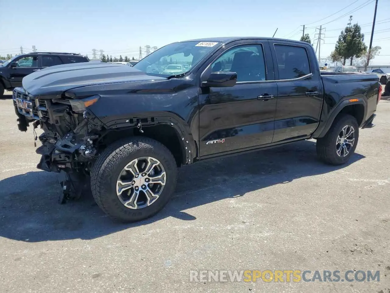 1 Photograph of a damaged car 1GTP6DEK8P1268779 GMC CANYON 2023